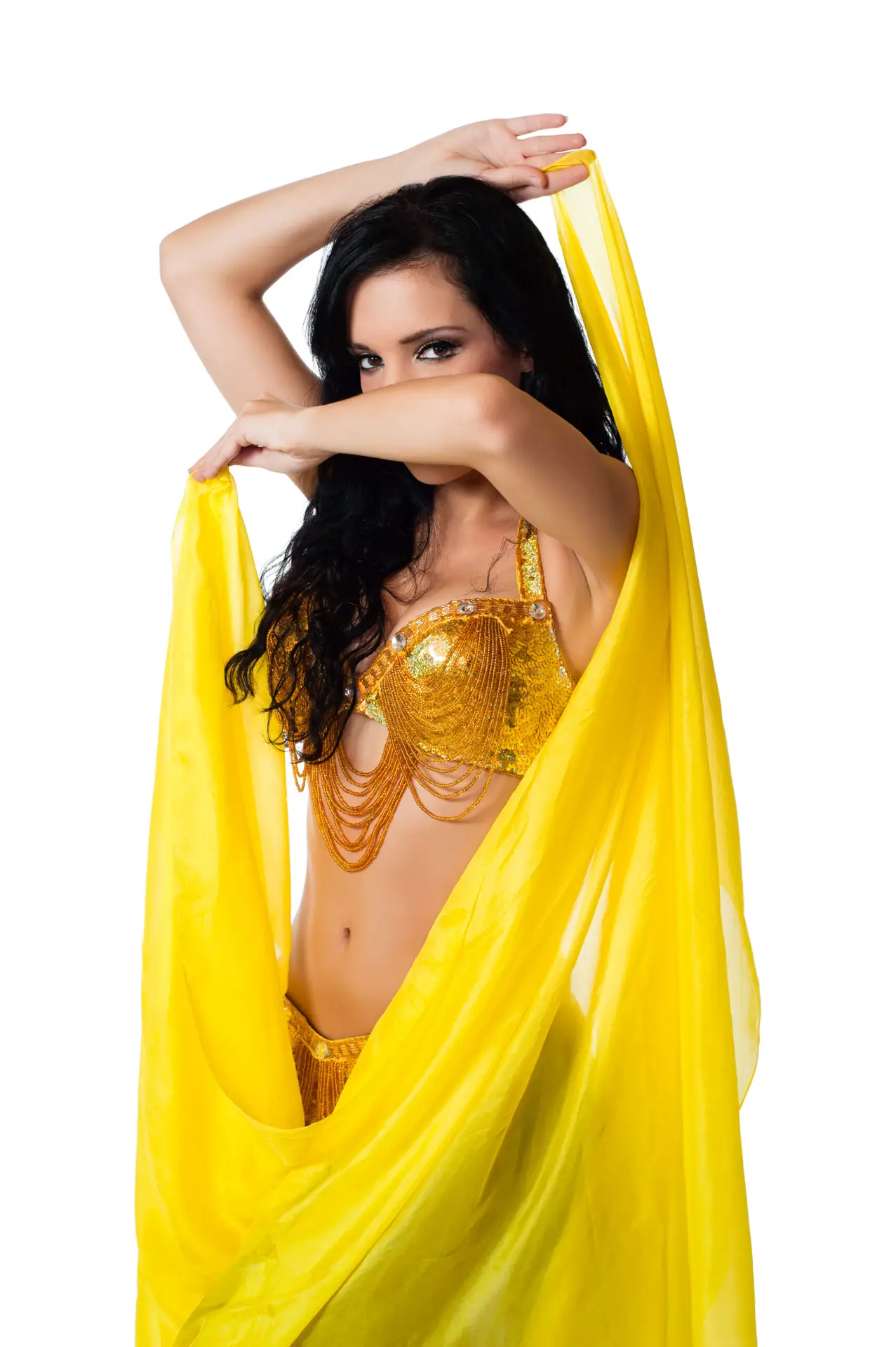 exotic,belly,dancer,wearing,a,gold,costume,and,posing,with